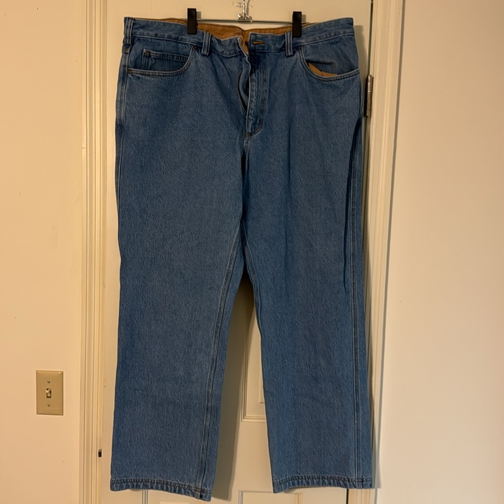 Duluth Trading Company Men’s light wash jeans. Size 42 X 32.